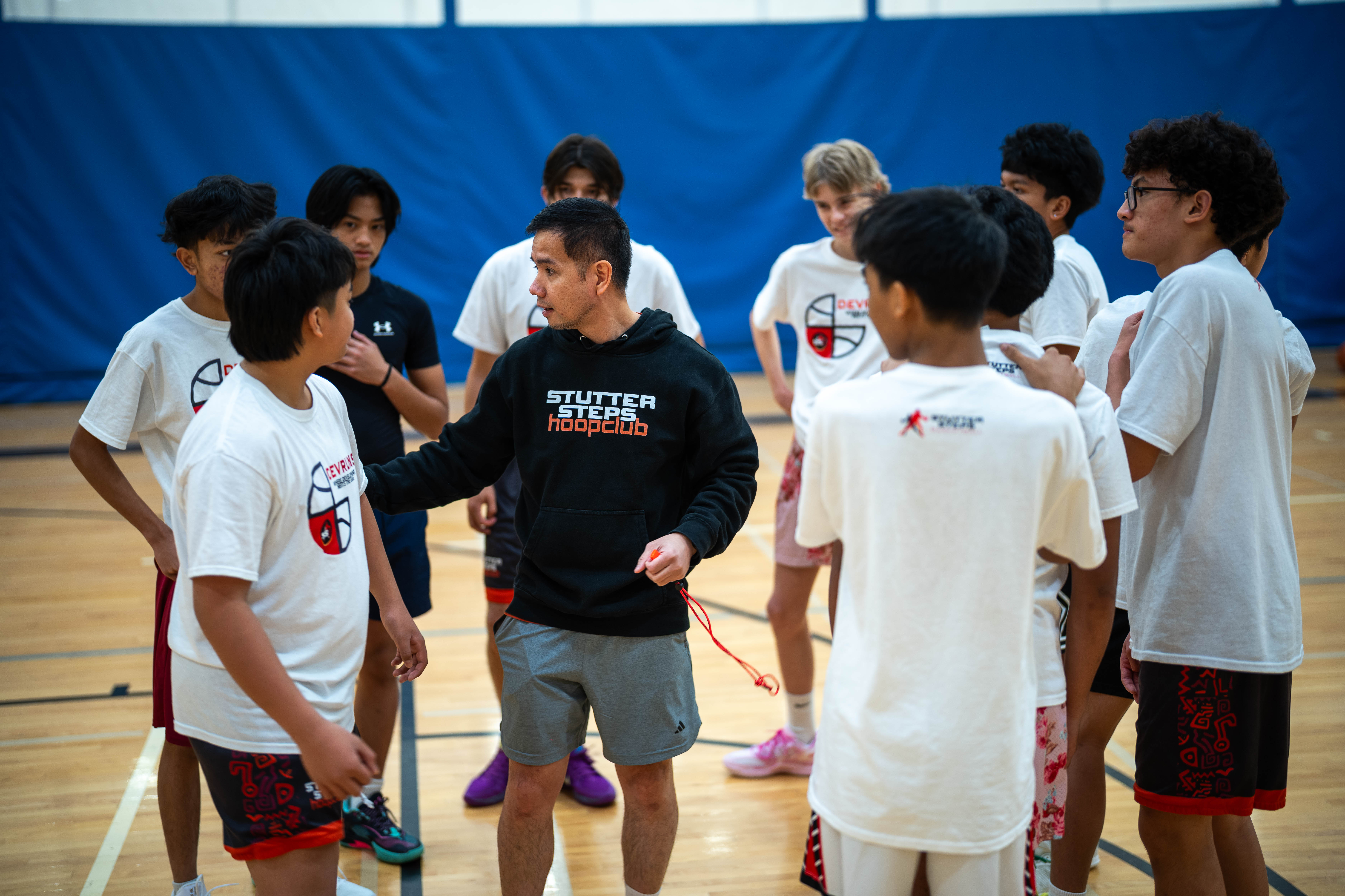 Coach leading a small-sided game during a Stutter Steps session